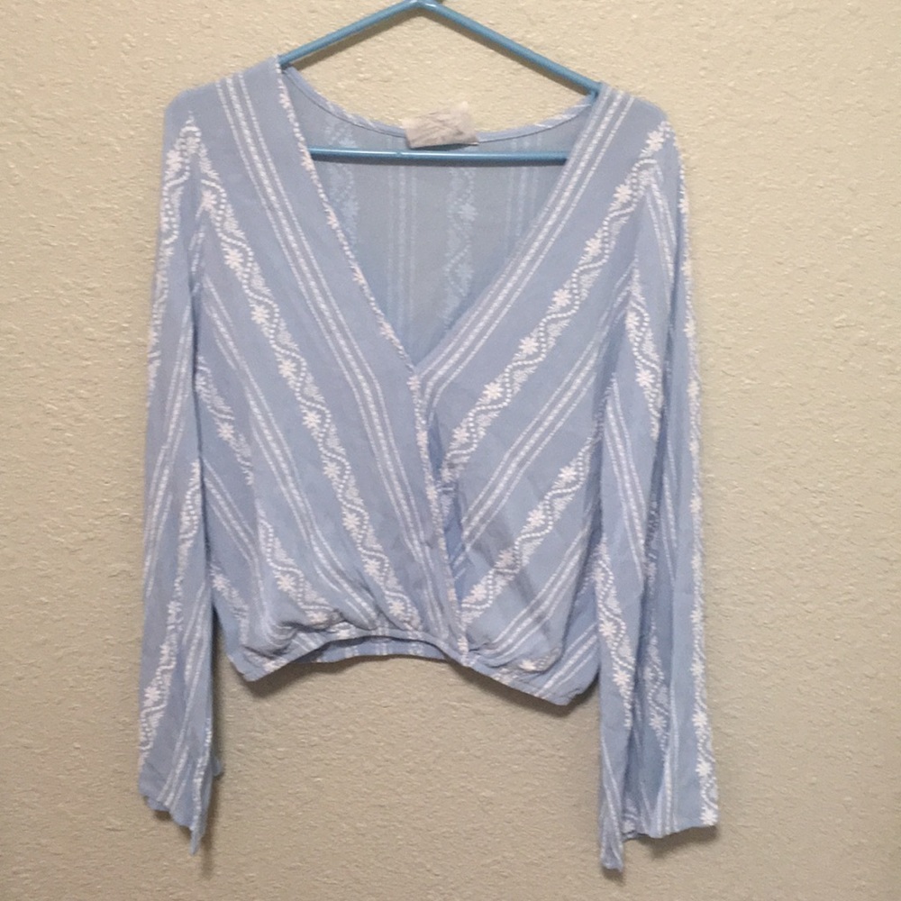 Blue blouse with flares sleeves